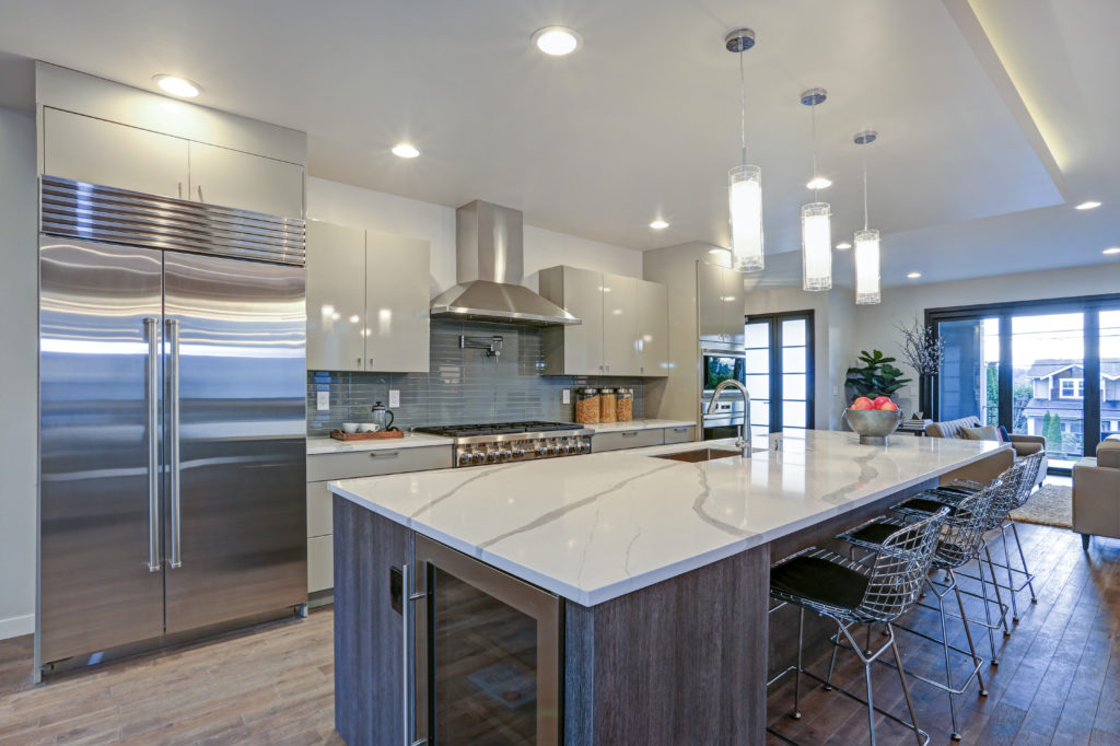 a beautiful kitchen with a quartz countertop