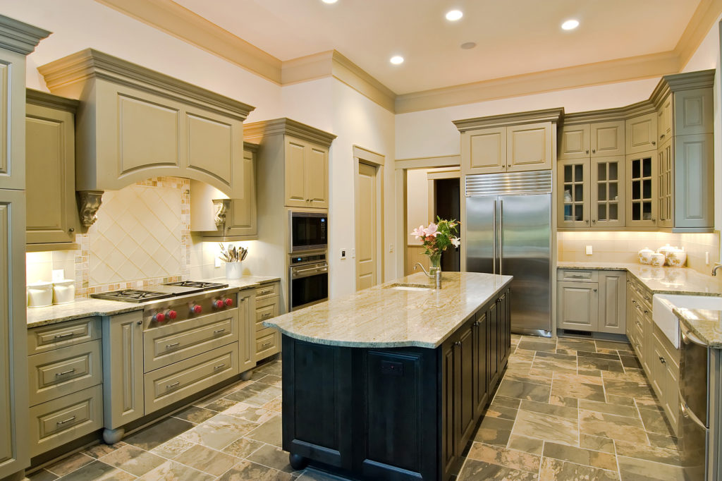 A beautiful kitchen in El Paso with custom cabinets and granite countertops.