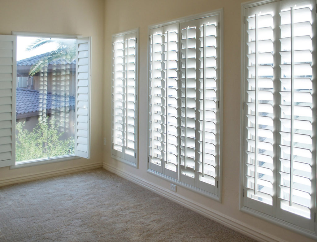 White plantation shutters in an El Paso home.