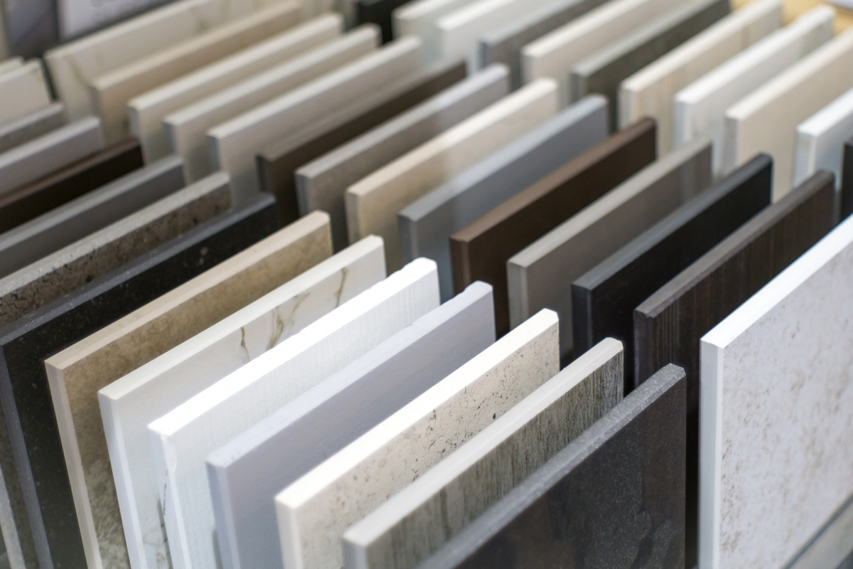 Squares of different types of granite slabs in El Paso.