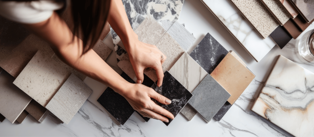 A woman with different kitchen countertop samples